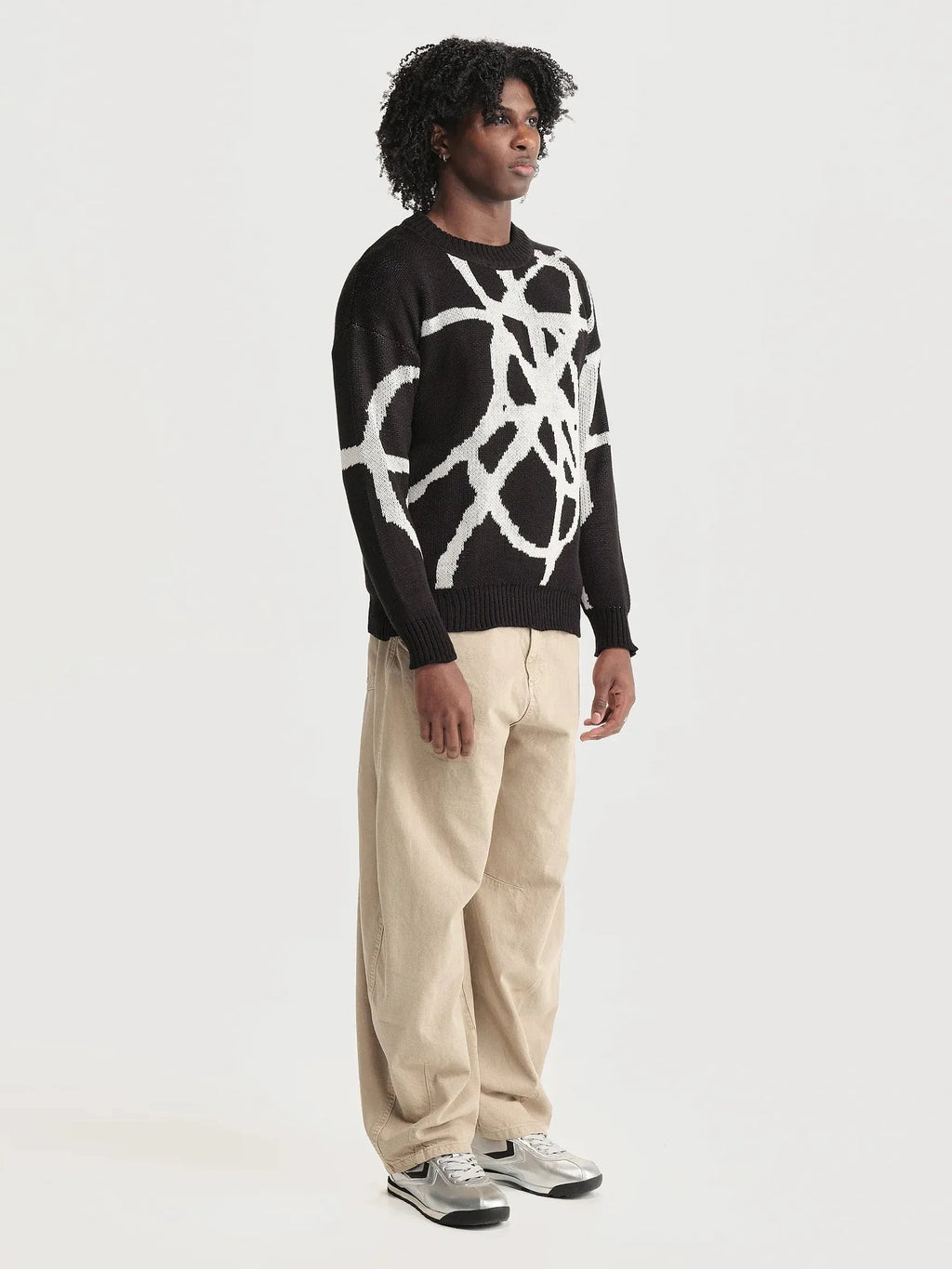 Sweater Nudo Hombre foto de lado